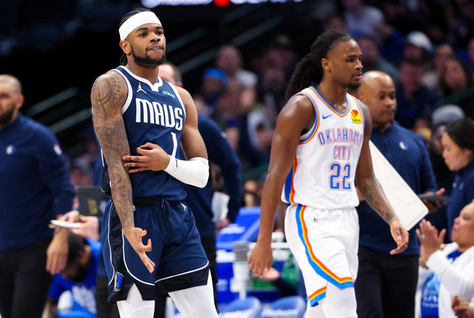 Feb 10, 2024; Dallas, Texas, USA; Dallas Mavericks guard <a class="link " href="https://sports.yahoo.com/nba/players/6727/" data-i13n="sec:content-canvas;subsec:anchor_text;elm:context_link" data-ylk="slk:Jaden Hardy;sec:content-canvas;subsec:anchor_text;elm:context_link;itc:0">Jaden Hardy</a> (1) reacts in front of Oklahoma City Thunder guard Cason Wallace (22) after scoring during the first half at American Airlines Center. Mandatory Credit: Kevin Jairaj-USA TODAY Sports