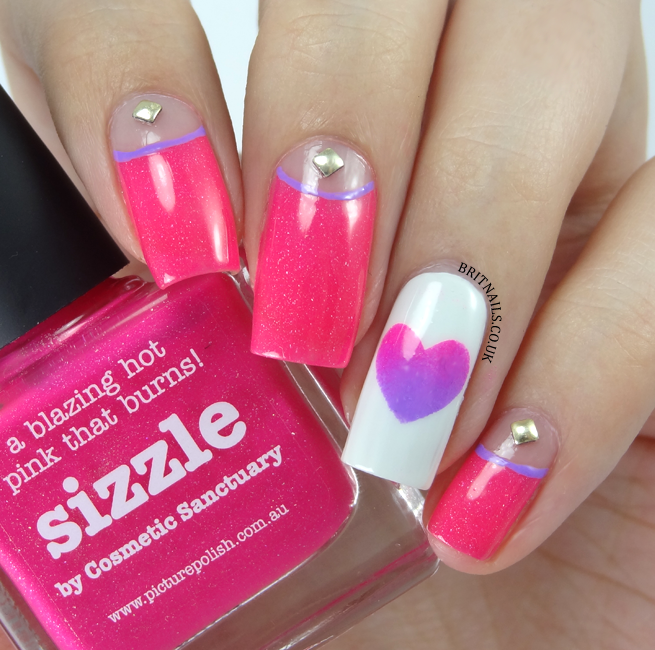 <p>Shiny studs, hot pink, and an ombré accent nail will ensure your manicure gets noticed. We love this look for the tween-teen age group.</p><p><strong>Get the tutorial at <a href="http://www.britnails.co.uk/2015/02/belated-valentines-half-moons.html" rel="nofollow noopener" target="_blank" data-ylk="slk:Brit Nails;elm:context_link;itc:0;sec:content-canvas" class="link ">Brit Nails</a>.</strong> </p>
