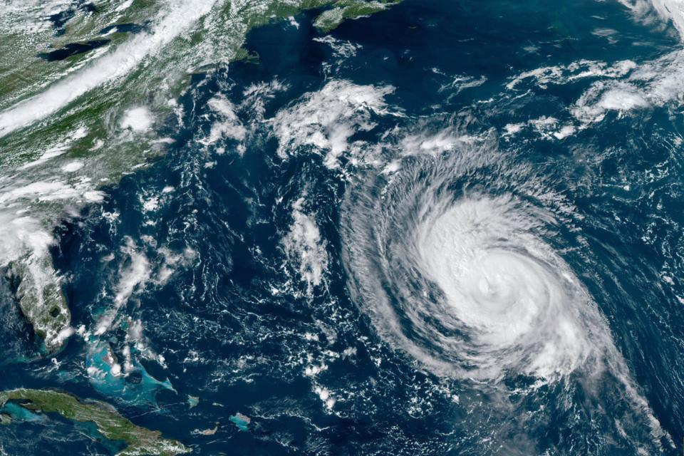 A satellite image taken Wednesday, Sept. 8, 2021, at 2:20 p.m. EDT, and provided by NOAA, shows Hurricane Larry in the Atlantic Ocean. The National Weather Service is warning that swells from Hurricane Larry will create dangerous rip current conditions.
