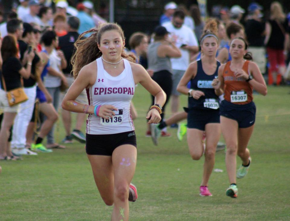 Episcopal's Lucrezia Gowdy (16136) surges into the lead during the girls varsity cross country event at the Katie Caples Invitational at Bishop Kenny High School in Jacksonville, Florida, on September 24, 2022. [Clayton Freeman/Florida Times-Union]