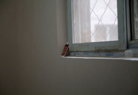 A ointment for skin disease sits by a window in a room at the accommodation where some patients and their family members stay while seeking medical treatments in Beijing, China, June 23, 2016. REUTERS/Kim Kyung-Hoon