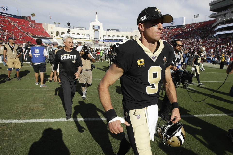 New Orleans Saints quarterback Drew Brees leaves the field after their loss against the Los Angeles Rams during an NFL football game Sunday, Sept. 15, 2019, in Los Angeles. Brees has been diagnosed with a torn ligament near the thumb of his throwing hand that is expected to sideline him at least six weeks, said a person familiar with the situation. Brees has elected to have surgery, but it is not yet clear when the operation will take place or who will perform it, the person said. The person spoke to The Associated Press on condition of anonymity Monday, Sept. 16, 2019. (AP Photo/Marcio Jose Sanchez, File)