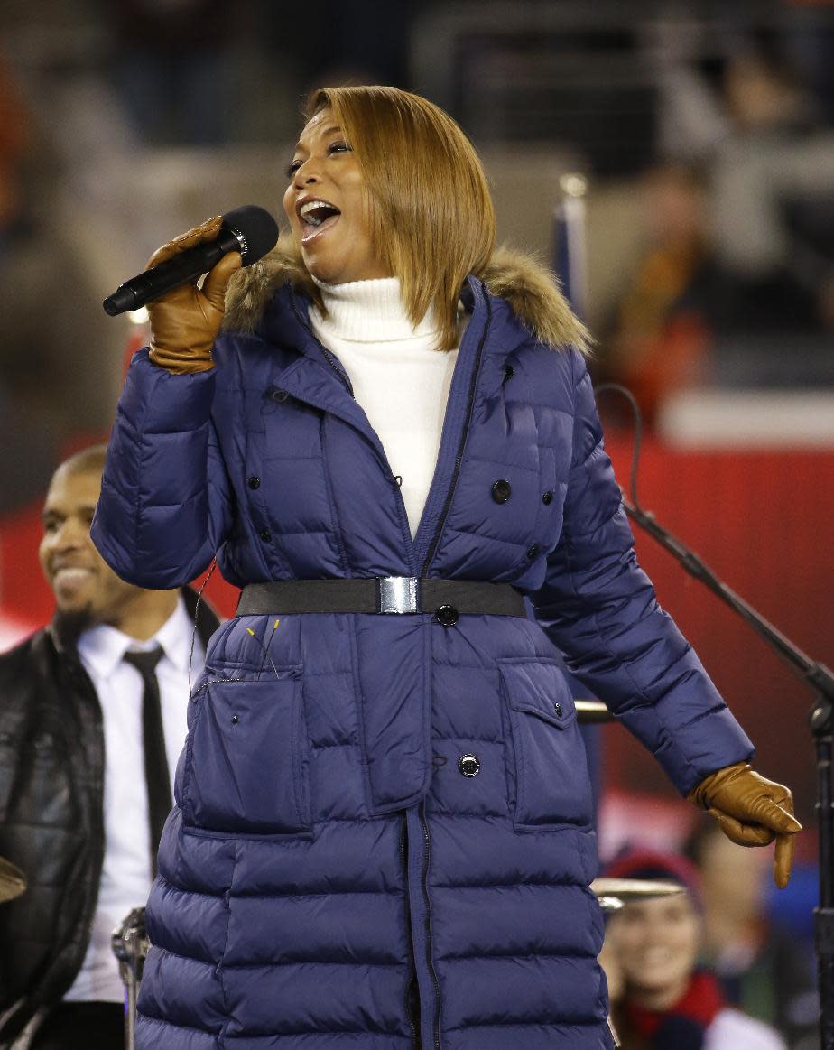 Queen Latifah sings "America the Beautiful" before the NFL Super Bowl XLVIII football game between the Seattle Seahawks and the Denver Broncos Sunday, Feb. 2, 2014, in East Rutherford, N.J. (AP Photo/Matt Slocum)