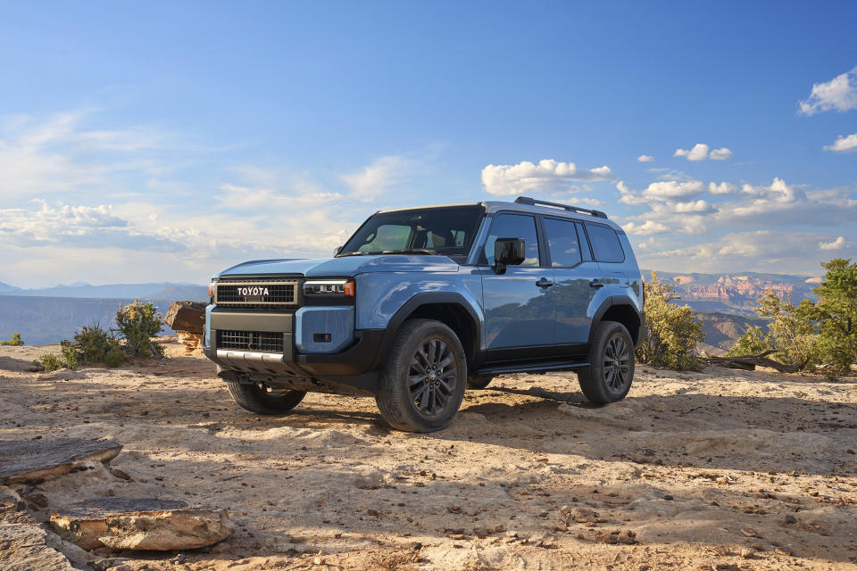 This photo provided by Toyota shows the 2024 Land Cruiser. It has a standard hybrid four-cylinder powertrain that gets an EPA-estimated 23 mpg in combined driving. (Jason Bax/ Toyota Motor Sales U.S.A. via AP)