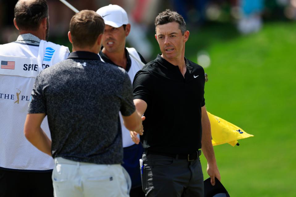 Rory McIlroy, seen here shaking hands with Jordan Spieth after his first round at The Players Championship, acknowledges the PGA Tour and golf has lost momentum so far in 2024.