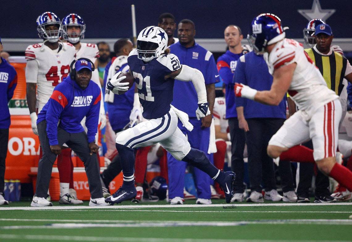 Dallas Cowboys running back Ezekiel Elliott runs the ball against the New York Giants during the first half on Thursday, November 24, 2022, at AT&T Stadium in Arlington.