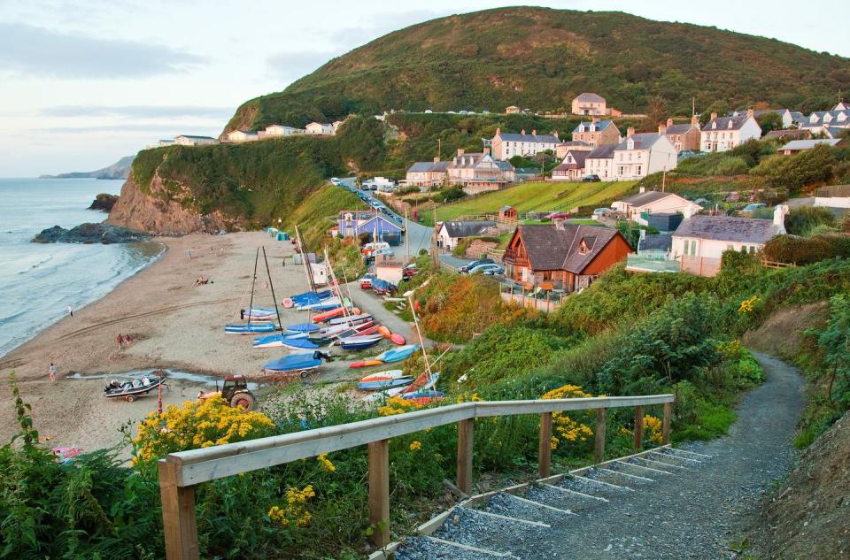 <p>It’s a fabulous beach in Wales and home to the Afon Saith stream, which cascades over the cliff at the right-hand end it, Tresaith is a sandy stretch popular for sailing, surfing and rock pooling. There's a cafe, a bucket-and-spade outlet and the Ship Inn, which serves up pub food and craft beers from the Brains brewery.</p><p><strong>Where to stay: </strong>Splash out on a stay at amazing Ty Dolffin, a five-bedroom house with sea views. There's a cinema, a pretty garden for alfresco feasts and huge windows to admire the location.</p><p><a class="link " href="https://airbnb.pvxt.net/0JomyO" rel="nofollow noopener" target="_blank" data-ylk="slk:SEE INSIDE;elm:context_link;itc:0;sec:content-canvas">SEE INSIDE</a></p>