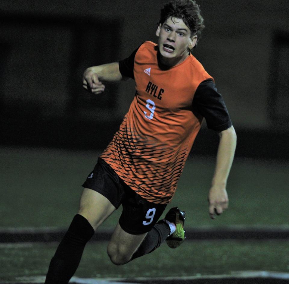 Ryle sophomore Brice Denigan celebrates after scoring a goal to give his Raiders a 1-0 lead during Ryle's 3-0 win over HIghlands in KHSAA boys soccer Sept. 7, 2023 at Ryle High School, Union, Ky.