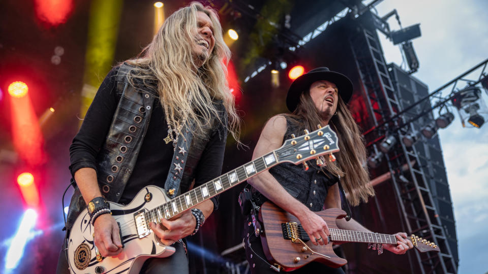 Joel Hoekstra (L) and Reb Beach from Whitesnake perform outside the Vikingship arena on June 02, 2022 in Hamar, Norway.