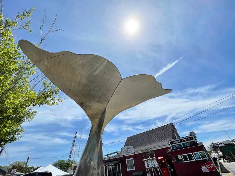 A whale tail sculpture is on display near the Pilot House Restaurant in downtown Kennebunkport.