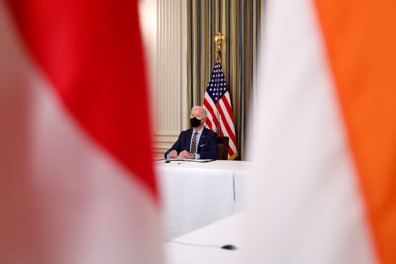 President Biden holds a virtual meeting with Asia-Pacific Quad nation leaders at the White House in Washington