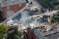 <p>Emergency service personnel work at the scene of a house explosion, Tuesday, Sept. 27, 2016, in the Bronx borough of New York. (AP Photo/Mary Altaffer) </p>