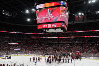 The Florida Panthers and the Carolina Hurricanes shake hands after the Panthers won Game 4 of the NHL hockey Stanley Cup Eastern Conference finals Wednesday, May 24, 2023, in Sunrise, Fla. (AP Photo/Lynne Sladky)