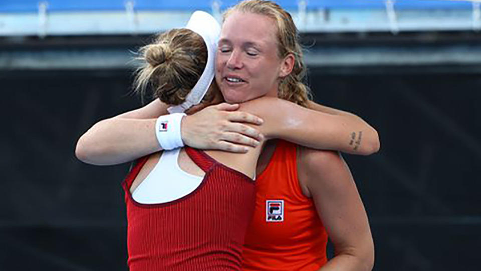 Marketa Vondrousova, pictured here consoling Kiki Bertens after ending her singles career.