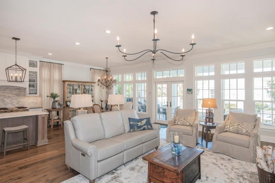 The living room adjoins the kitchen and dining space.