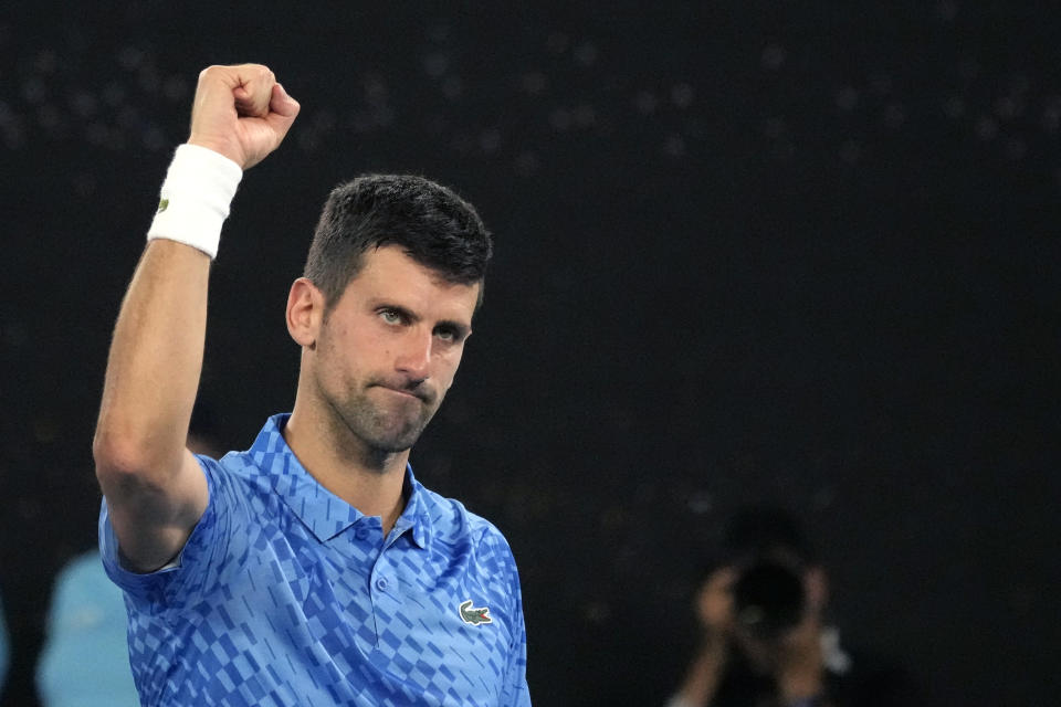 Novak Djokovic of Serbia reacts after defeating Alex de Minaur of Australia in their fourth round match at the Australian Open tennis championship in Melbourne, Australia, Monday, Jan. 23, 2023. (AP Photo/Aaron Favila)