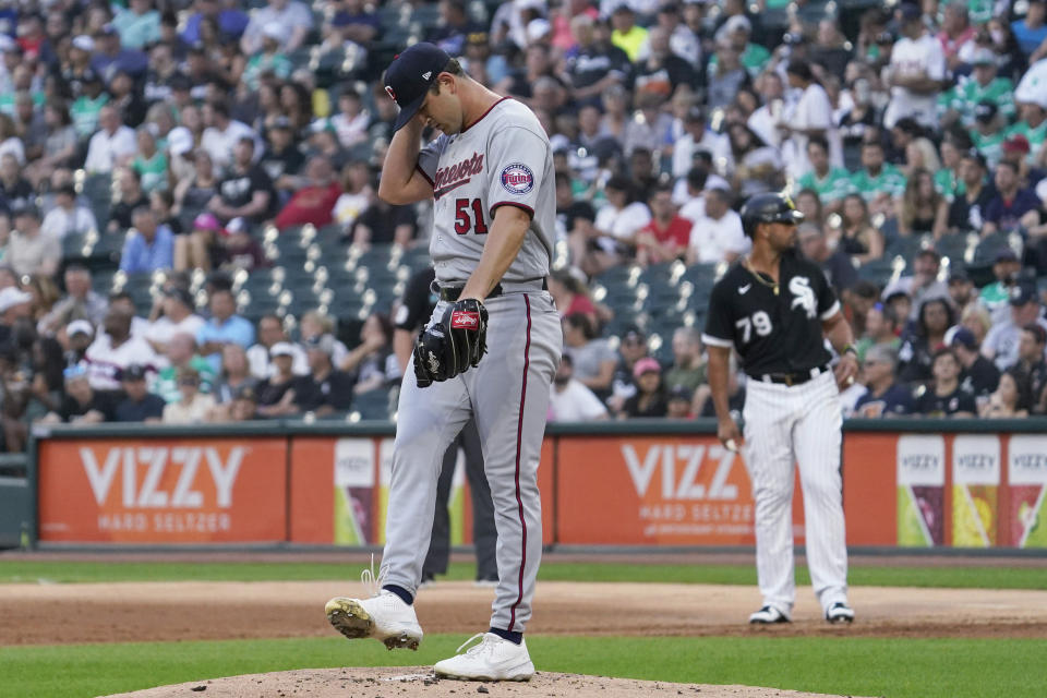 Minnesota Twins starting pitcher Tyler Mahle kicks the mound after Chicago White Sox's Jose Abreu hit a one-run single during the first inning of a baseball game in Chicago, Saturday, Sept. 3, 2022. (AP Photo/Nam Y. Huh)
