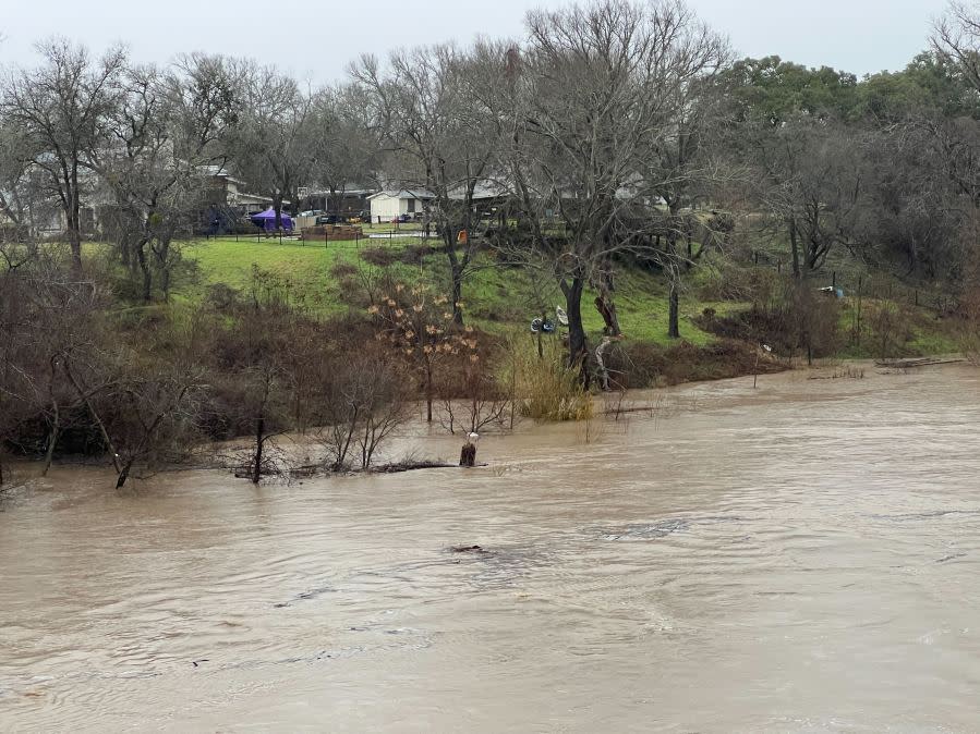 View of the Colorado River from Highway 77 in La Grange after heavy rains moved through Fayette County on Jan. 24, 2023. (KXAN Photo/Todd Bailey)