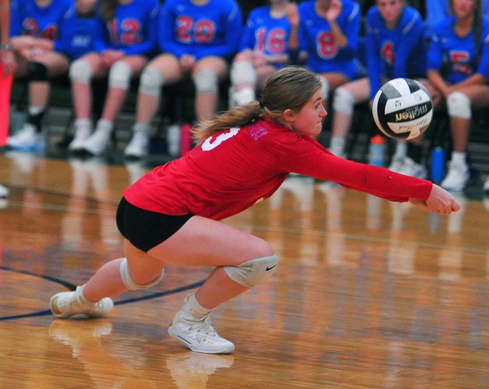Tuslaw's Jenna Boyd dives for one of her career-high 43 digs.