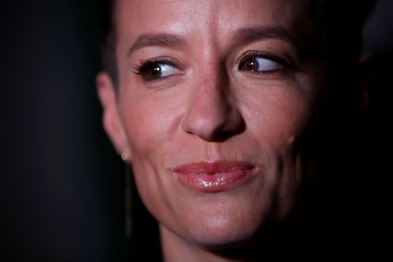 Megan Rapinoe poses as she arrives for Sports Illustrated Sportsperson of the Year Awards in New York