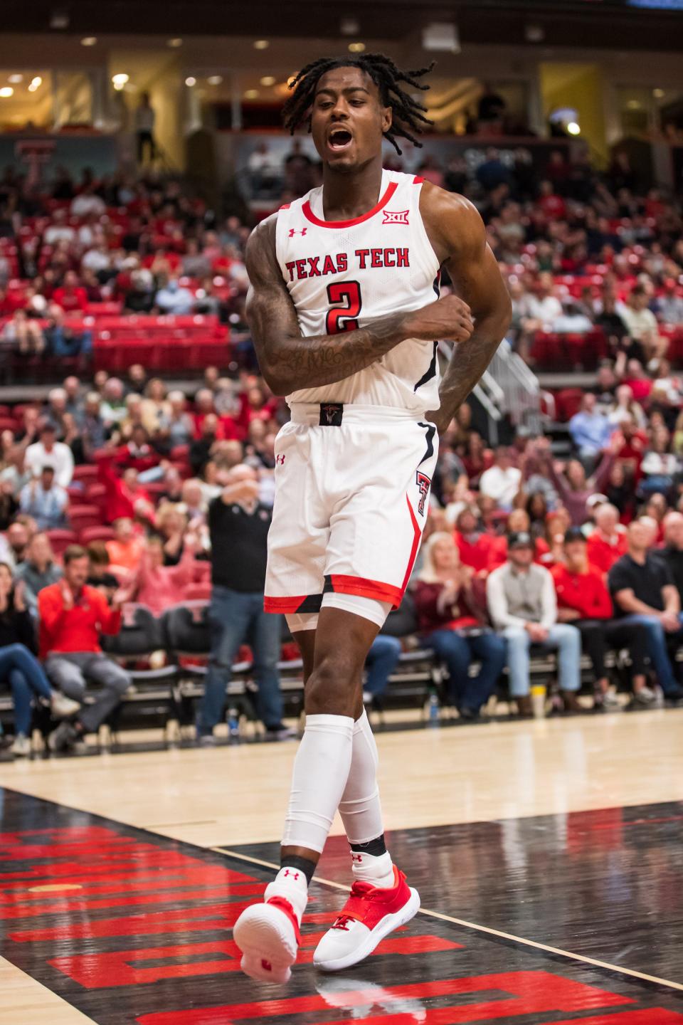 Texas Tech guard Davion Warren (2) reacts after dunking the ball against Prairie View A&M on Monday, Nov. 15, 2021, at United Supermarkets Arena in Lubbock, Texas.