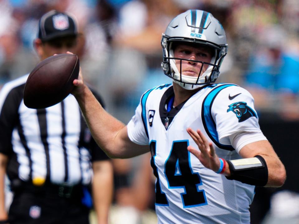 Sam Darnold attempts a pass against the New Orleans Saints.