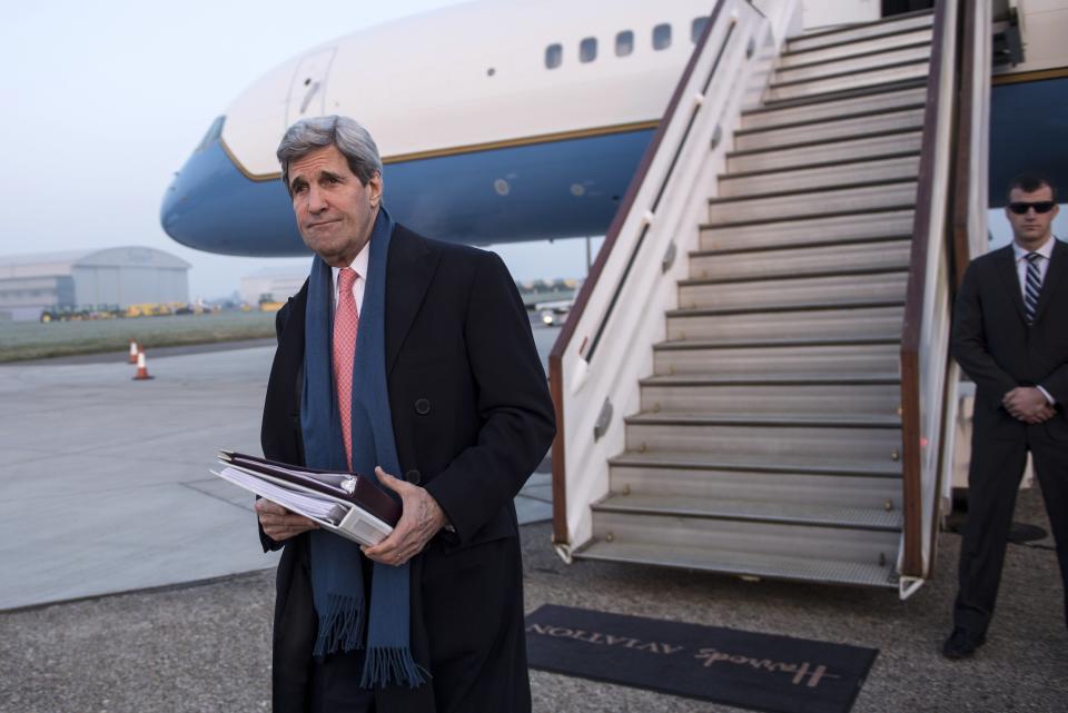 U.S. Secretary of State John Kerry arrives at London Stansted Airport on March 14, 2014. Kerry arrived in London on March 14 on an 11th-hour mission to head off a possible Russian annexation of Crimea on the heels of a breakaway vote by the Ukrainian region. (Photo credit should read BRENDAN SMIALOWSKI/AFP/Getty Images)