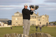 New Zealand's Ryan Fox lifts the trophy following day four of the Alfred Dunhill Links Championship 2022 at St Andrews golf course in Scotland, Sunday Oct. 2, 2022. (Steve Welsh/PA via AP)