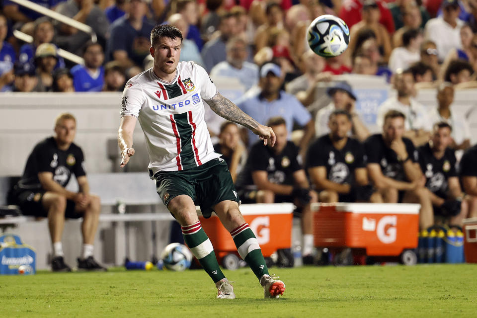 Wrexham's Liam McAlinden passes the ball against Chelsea during the second half of a club friendly soccer match Wednesday, July 19, 2023, in Chapel Hill, N.C. (AP Photo/Karl B DeBlaker)