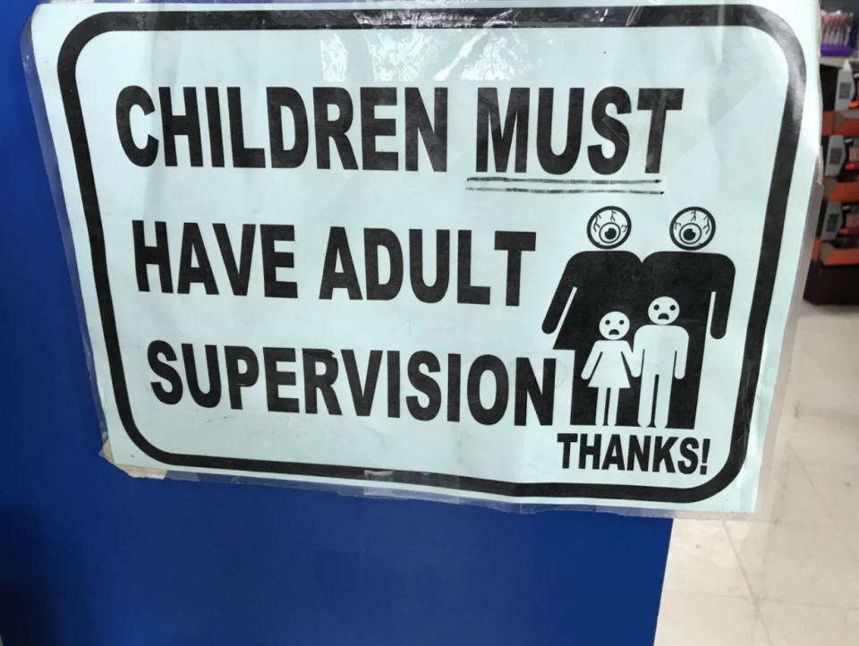 Sign reads "CHILDREN MUST HAVE ADULT SUPERVISION THANKS!" with icons of two adults with eyeballs for heads and two children below