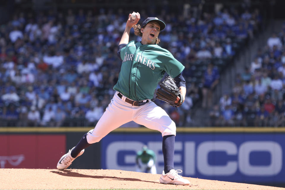 Seattle Mariners starting pitcher Logan Gilbert throws against the Toronto Blue Jays during the first inning of a baseball game, Saturday, July 22, 2023, in Seattle. (AP Photo/Jason Redmond)