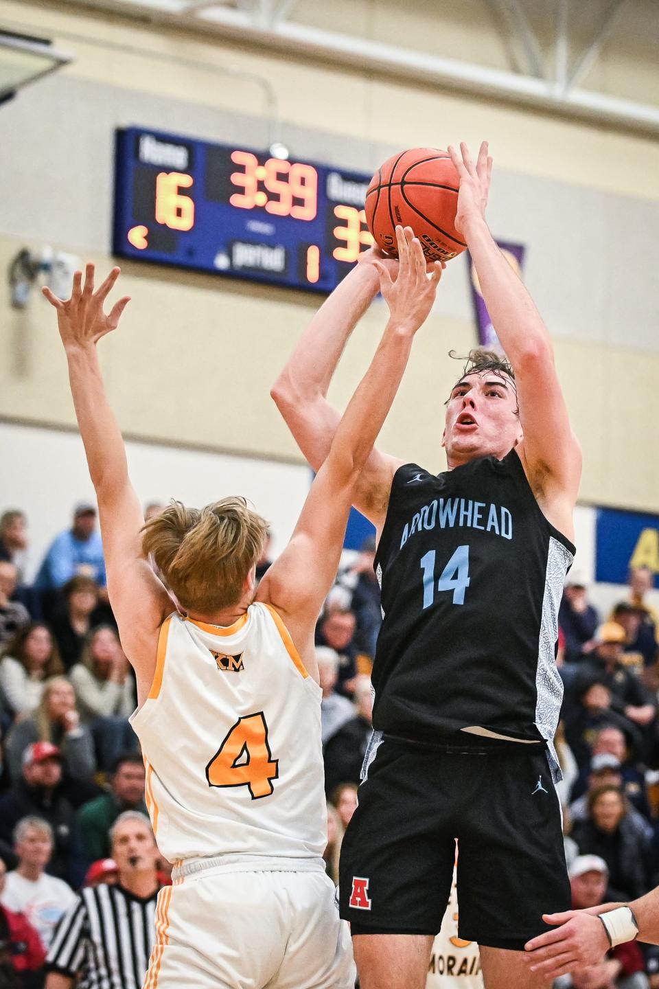 Bennett Basich (14) and Arrowhead got the better of Kettle Moraine in their December meeting, but the Lasers won the second, setting up the possibility their season series could be decided in the state championship game.