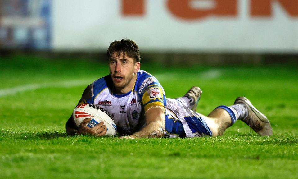 <span>Paul Momirovski scores his and Leeds’ second try.</span><span>Photograph: Richard Sellers/PA</span>