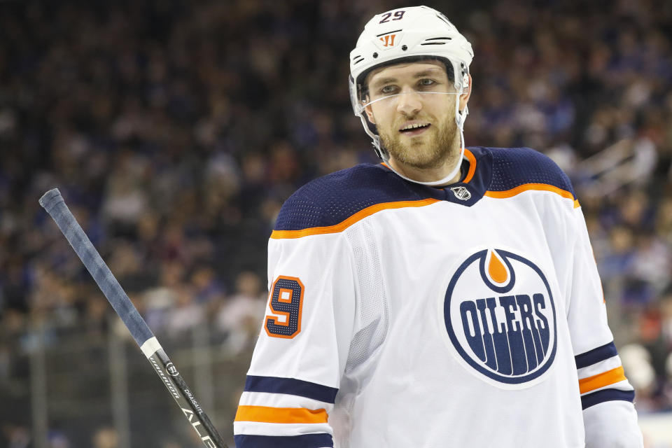 FILE - In this Oct. 12, 2019, file photo, Edmonton Oilers center Leon Draisaitl lines up for a face-off during the first period of an NHL hockey game against the New York Rangers, at Madison Square Garden in New York. Draisaitl wins the Art Ross Trophy for points, the leaguer announced Thursday, May 28, 2020. (AP Photo/Mary Altaffer, File)