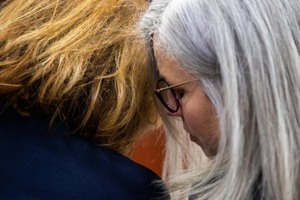 Ottawa County Health Officer Adeline Hambley (right) speaks with her lawyer Sarah Riley-Howard (left) Friday, March 31, 2023, at the Michigan 14th Circuit Court in Muskegon.