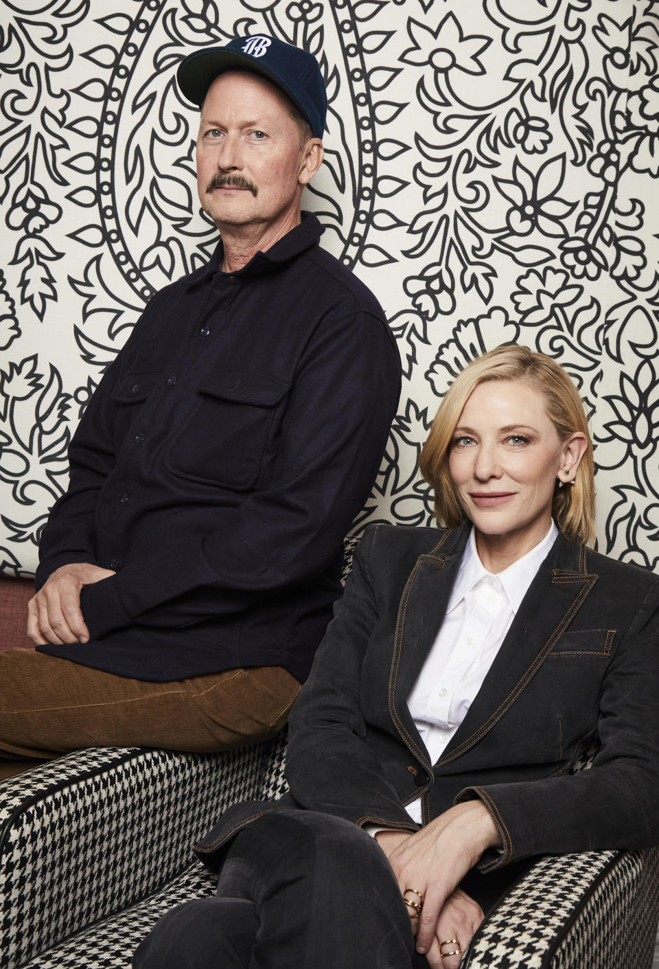 Todd Field, left, and Cate Blanchett pose for a portrait on Oct. 2, 2022, in New York to promote the film Tár,” in which Blanchett plays a trailblazing conductor whose status is threatened amid a misconduct scandal of her own making. (Photo by Matt Licari/Invision/AP)