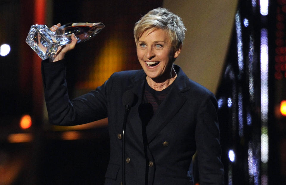 Ellen DeGeneres accepts the award for favorite daytime TV host at the 40th annual People's Choice Awards at the Nokia Theatre L.A. Live on Wednesday, Jan. 8, 2014, in Los Angeles. (Photo by Chris Pizzello/Invision/AP)