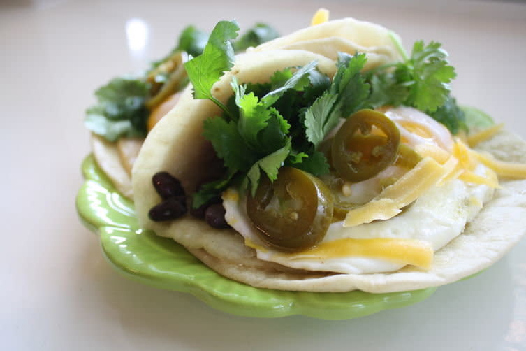 <strong>Get the <a href="http://food52.com/recipes/27333-the-ultimate-fried-egg-breakfast-tacos" target="_blank">Ultimate Fried Egg Breakfast Taco</a> recipe by arielleclementine from Food52</strong>