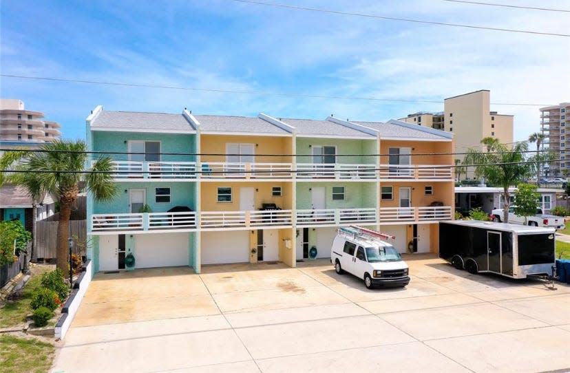 Live in one unit and rent the other three in this solid-concrete four-plex that is a half block to beach access at the new Dahlia Avenue Park and restaurants.
