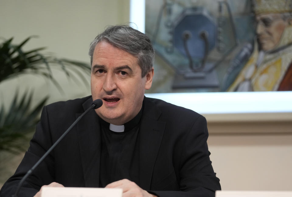 Pontifical Commission for the Protection of Minors Secretary Father Andrew Small speaks during a press conference at The Vatican, Friday, April 29, 2022, after they met with Pope Francis. Pope Francis called Friday for Catholic bishops conferences to create special centers to welcome victims of clergy sexual abuse to help them find healing and justice, as he warned that the faithful would continue losing trust in the hierarchy without more transparency and accountability. (AP Photo/Andrew Medichini)