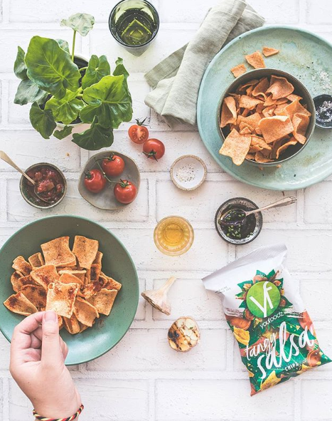 Youfoodz Dietitian Margaret Mielczarek says keeping healthy go-to snacks like the tangy salsa chips at your desk will stop the temptation to hit the vending machine. Photo: Youfoodz