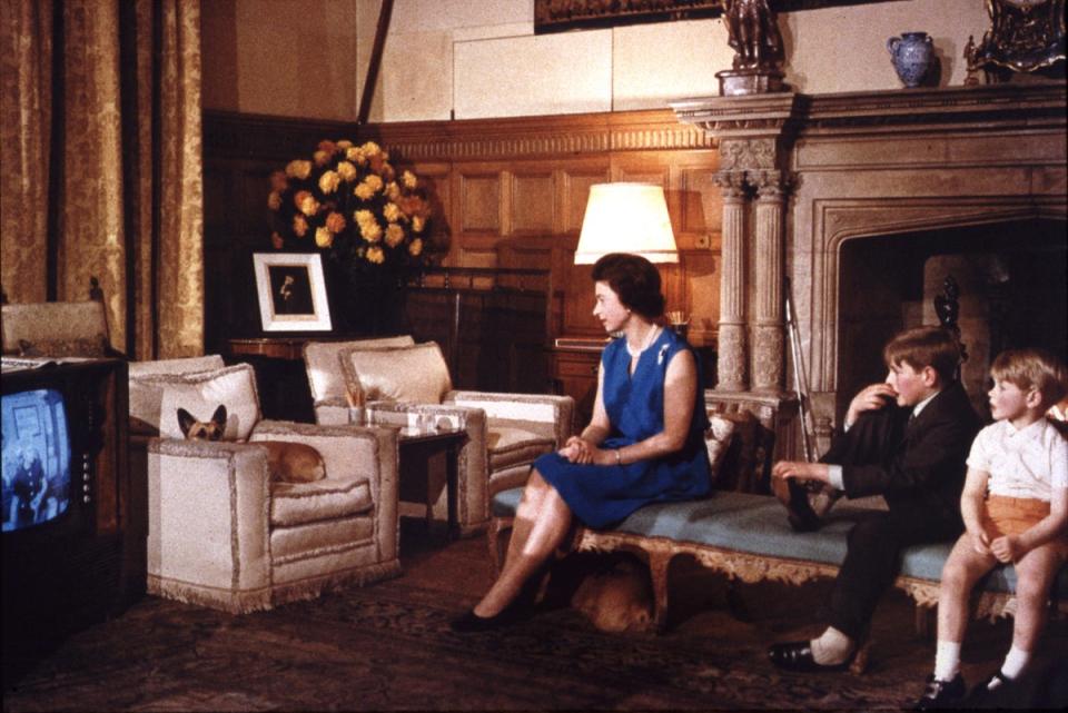 Queen Elizabeth II, Andrew, Edward and two corgis watch TV at Sandringham in 1969 (JOAN WILLIAMS)