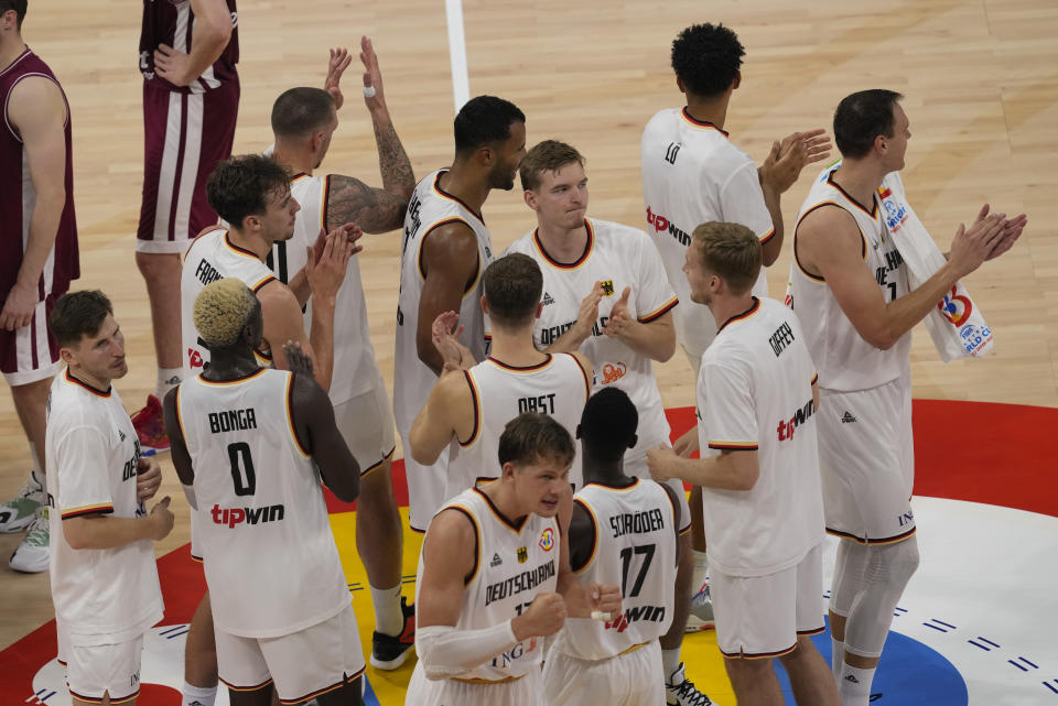 Germany celebrates after defeating Latvia in their Basketball World Cup quarterfinal in Manila, Philippines, Wednesday, Sept. 6, 2023. (AP Photo/Aaron Favila)