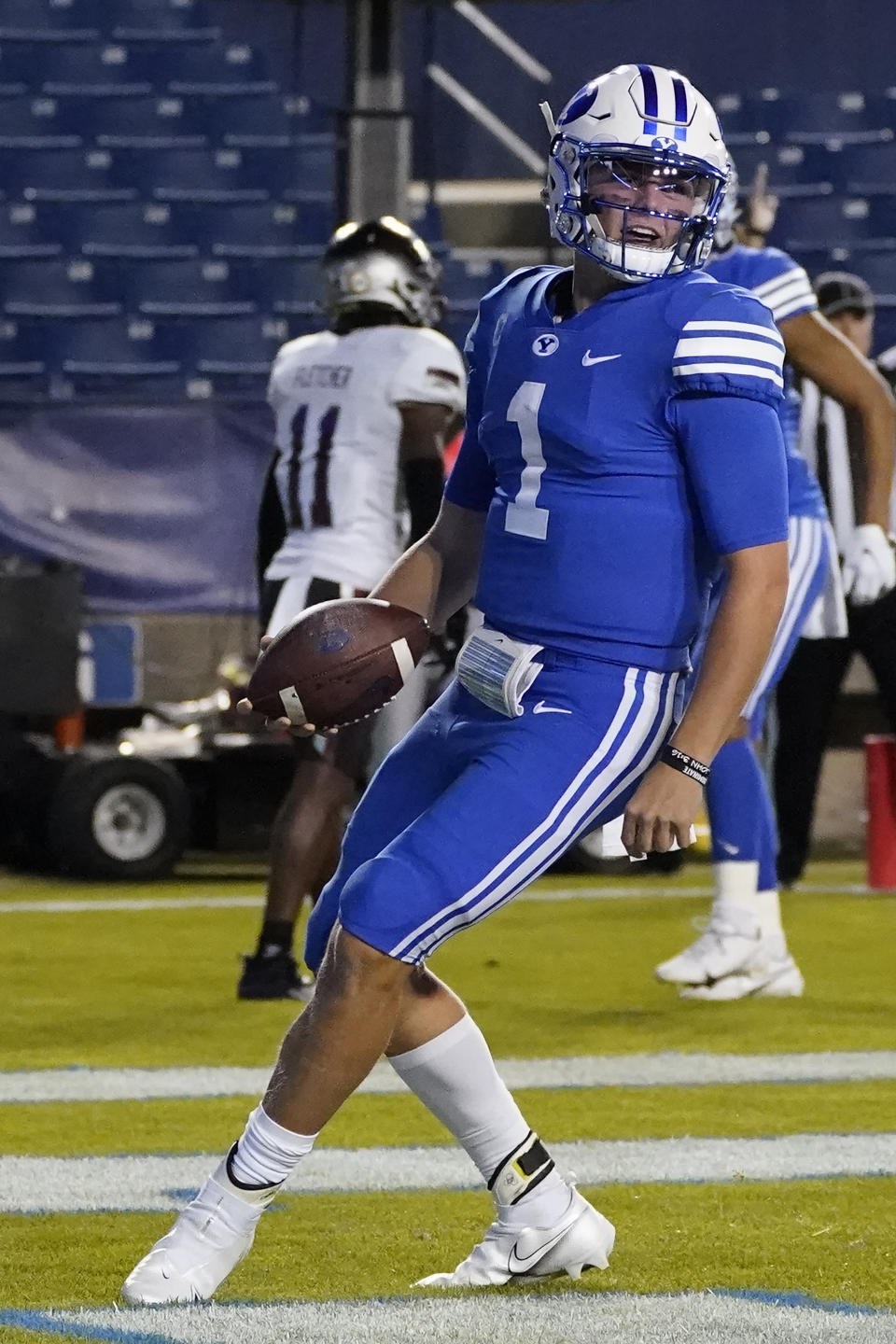 BYU quarterback Zach Wilson (1) scores a touchdown against Troy during the second half of an NCAA college football game Saturday, Sept. 26, 2020, in Provo, Utah. (AP Photo/Rick Bowmer, Pool)