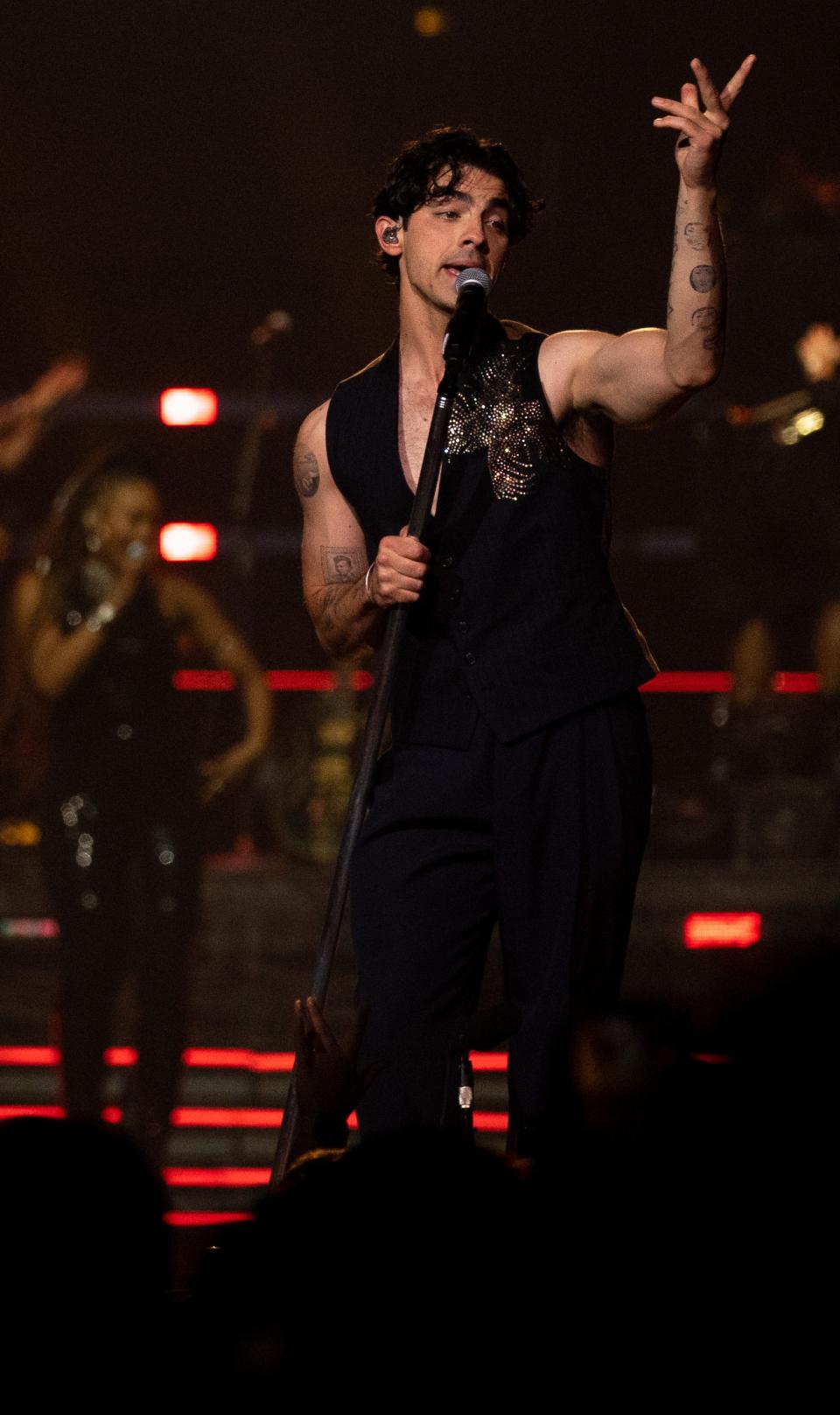 Joe Jonas performs with the Jonas Brothers at Bridgestone Arena in Nashville, Tenn., Monday, Oct. 9, 2023.