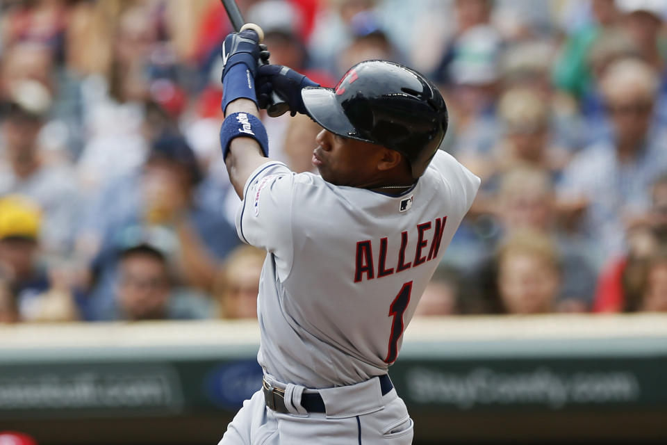 Cleveland Indians' Greg Allen hits a solo home run off Minnesota Twins pitcher Jose Berrios in the first inning of a baseball game Sunday, Aug. 11, 2019, in Minneapolis. (AP Photo/Jim Mone)