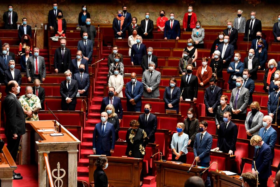 French Prime Minister Jean Castex observes a minute's silence in tribute to the victims of a knife attack in Nice (AFP via Getty Images)