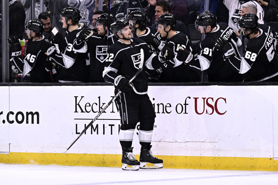 Los Angeles Kings left wing Kevin Fiala, center, is congratulated for his goal against the Arizona Coyotes during the third period of an NHL hockey game in Los Angeles, Thursday, Dec. 1, 2022. (AP Photo/Alex Gallardo)