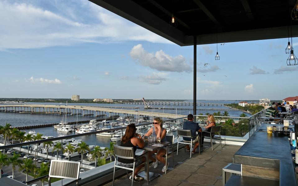 Oak &amp; Stone’s downtown Bradenton location features a rooftop bar dubbed The Deck. It’s at the top of the eight story Springhill Suites hotel, overlooking the Manatee River with views of the Palmetto shoreline, Tampa Bay and the Sunshine Skyway Bridge.