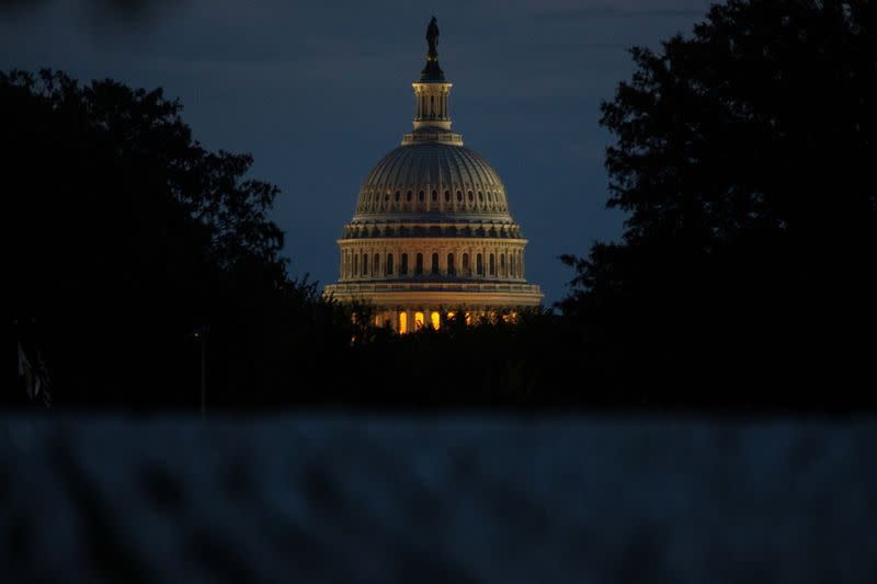 The U.S. Capitol building is pictured at dawn along the National Mall in Washington